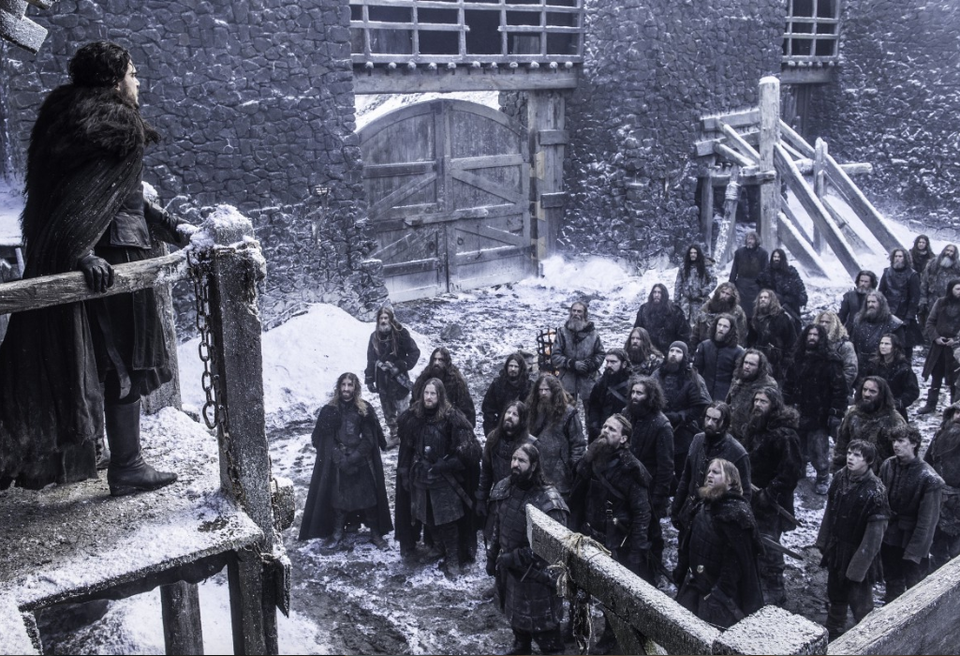 Kit Harington and extras on the Castle Black set