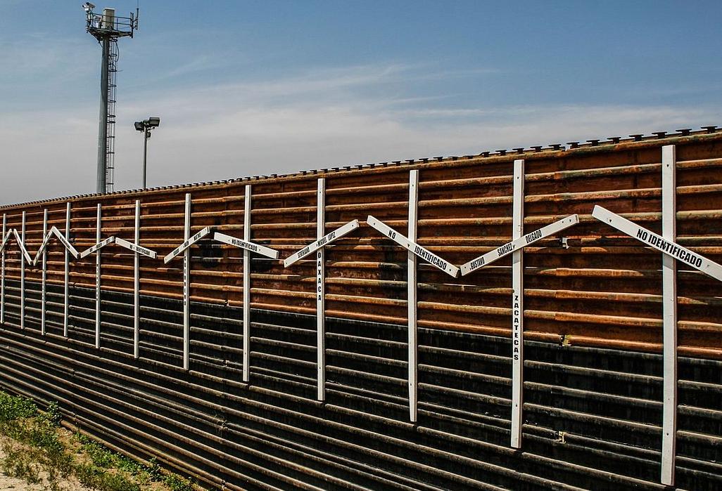 The crosses on the border fence, which Trump wants to replace, represent migrants who died in the crossing attempt, some identified, some not.   
