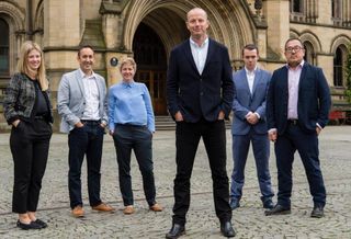  Gavin Taylor, Regional General Manager of FEC (centre) and the Manchester project team