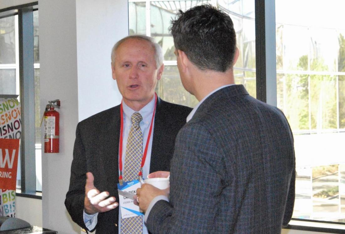 4Terra Investments CEO Rick Lamprecht talking to an attendee. 4Terra Investments CEO Rick Lamprecht talks to an attendee at Bisnow's Mixed Use mania event March 28 at Newport Beach.