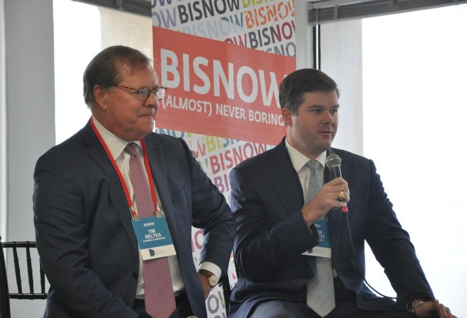 Cushman & Wakefield Executive Vice Chairman Tim Relyea, Transwestern Vice President Tyler Garrett