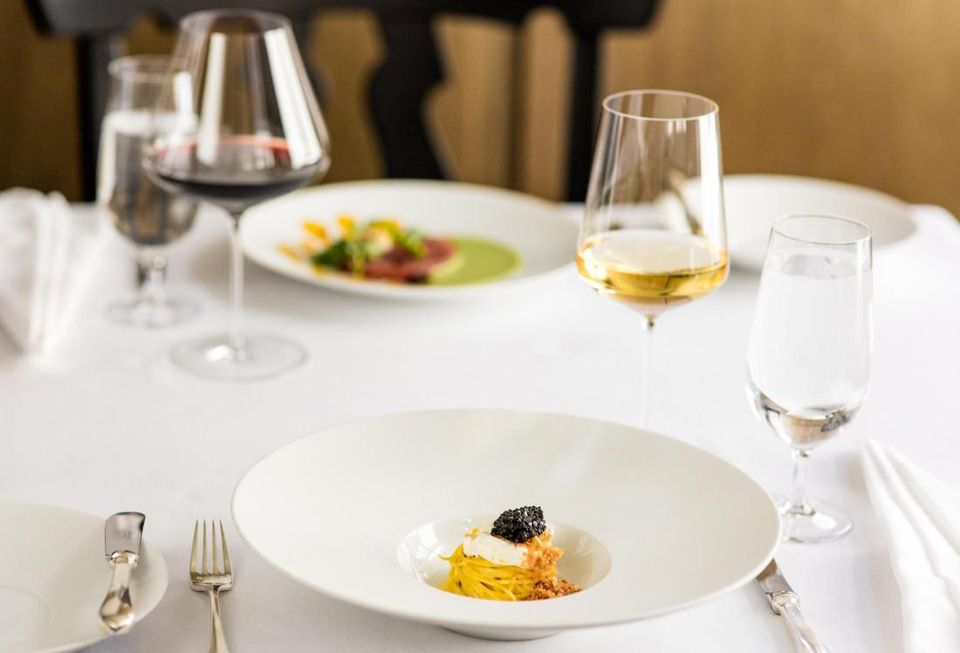 Boston's Upscale Menton Dining Table