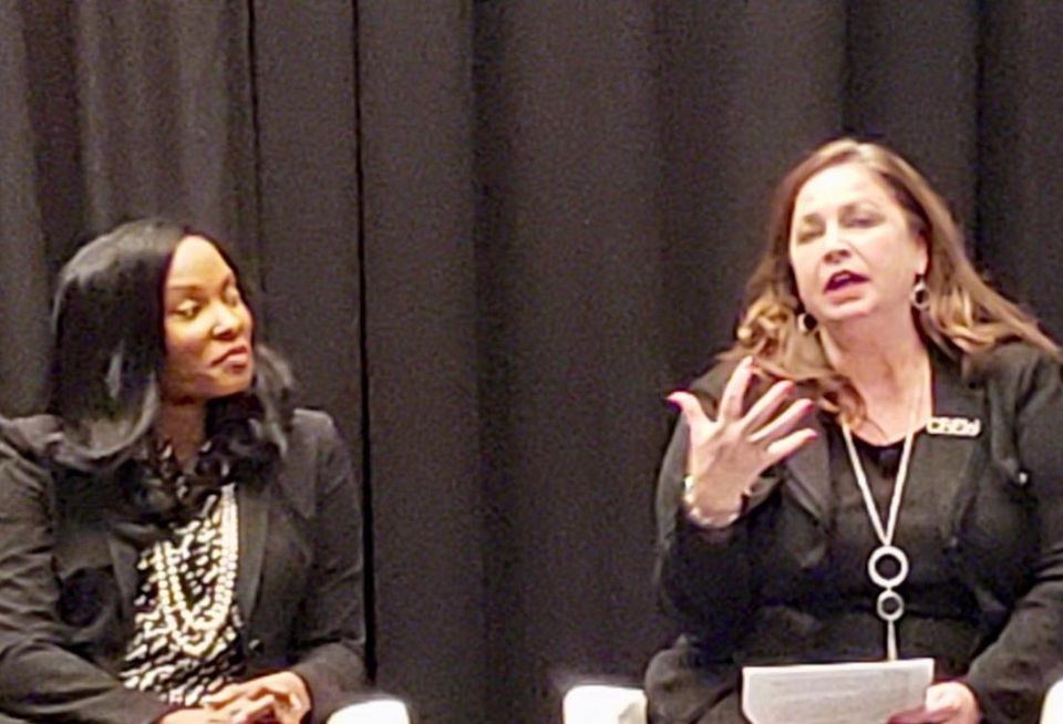 NFL's Jocelyn Moore listens to CREW Network’s Wendy Mann during a panel on diversity at ICSC RECon Las Vegas.