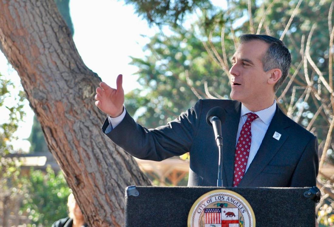 Los Angeles Mayor Eric Garcetti speaks to residents celebrating the $35M grant for the city of Watts.