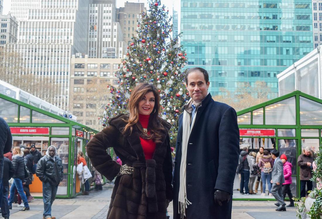 Eastern Consolidated's Adelaide Polsinelli and New York Historical Tours' Kevin Draper at Bryant Park's Winter Village