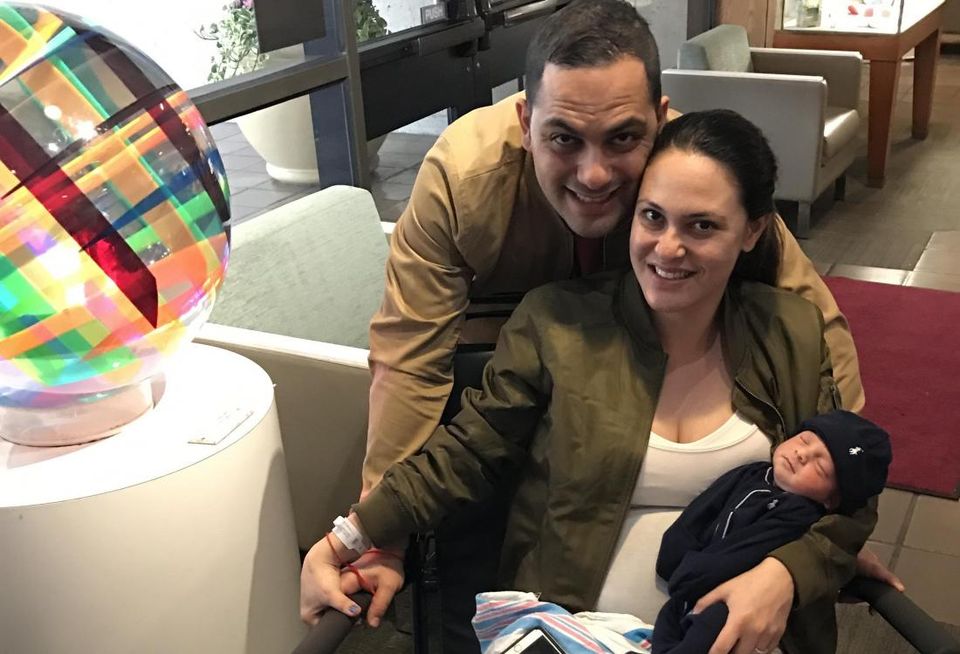 Shahin Yazdi and his wife and baby.