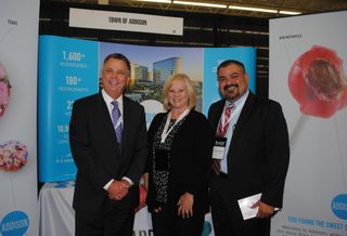 Addison Mayor Todd Meier, economic development director Orlando Campos and Addison Airport deputy director Darci Neuzil