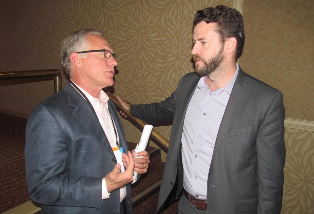 Space Between Design Studio's Patrick Kennedy (right) talking with James Hankins at Bisnow DFW mixed-use event May '16