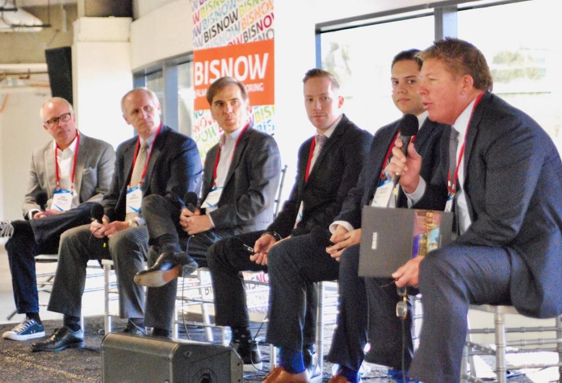 Berkadia Managing Director Jeff Rowerdink speaks during a panel Orange County multifamily and mixed-use March 28 at Bisnow’s Orange County’s Mixed-Use Mania at Koll Center Newport 5000 Birch St. in Newport Beach. From left to right, Trammell Crow Residential President, Construction Tony Ditteaux, 4Terra Investments CEO Rick Lamprecht, Hunt Mortgage Group Director Mark Besharaty, CityView Director Stephen Anderson, Walker & Dunlop Vice President Steven Natale.