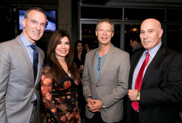 Rand Engineering & Architecture's Peter Scallion, Eastern Consolidated's Adelaide Polsinelli, The Riese Org.'s James Rosenzweig and Rand's Jeffrey Stein at a rooftop client party hosted by Polsinelli