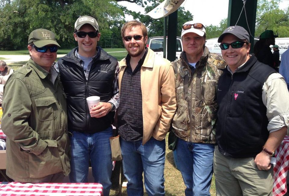 SRS EVP and market leader Mark Reeder (second from right) with buddies skeet shooting