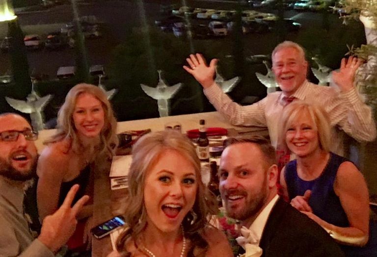 TIG Real Estate Services director of acquisitions and development Brad McJunkin with family at his daughter's wedding in Vegas