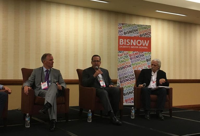Chris Stanley, center, speaking