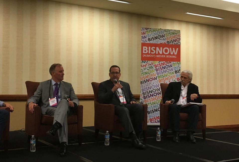 Chris Stanley, center, speaking