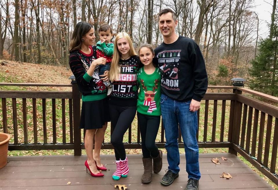 Aaron Halfacre poses with his family in this undated photo.