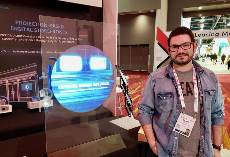 Glass-Media CEO Daniel Black displays his company's projection based digital storefront at the ICSC RECon event in Las Vegas. 