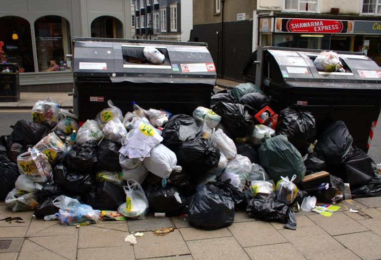 rubbish bins mess street 