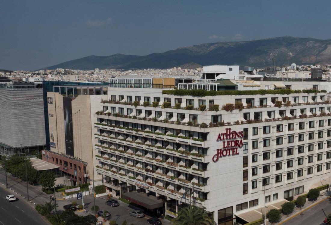 As Greece Reaches Debt Deal, Hines Dips Toe In Water