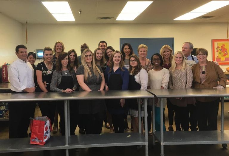 Republic Title’s Commercial office cooked and served lunch to 120 men and women at Austin Street Shelter around Thanksgiving. Austin Street provides food, sleeping arrangements and resources for homeless.