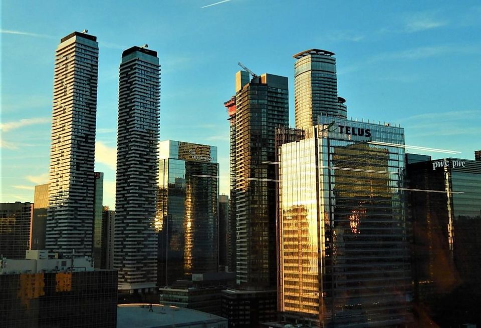 Altus Group report CRE tech Toronto skyline