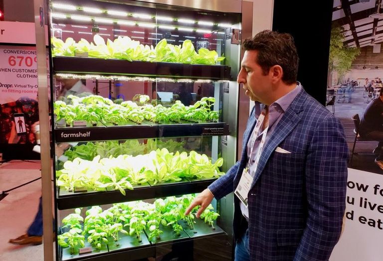 Farmshelf CEO Jean-Paul Kyrillos demonstrates an indoor hydroponics system at the ICSC RECon event in Las Vegas.