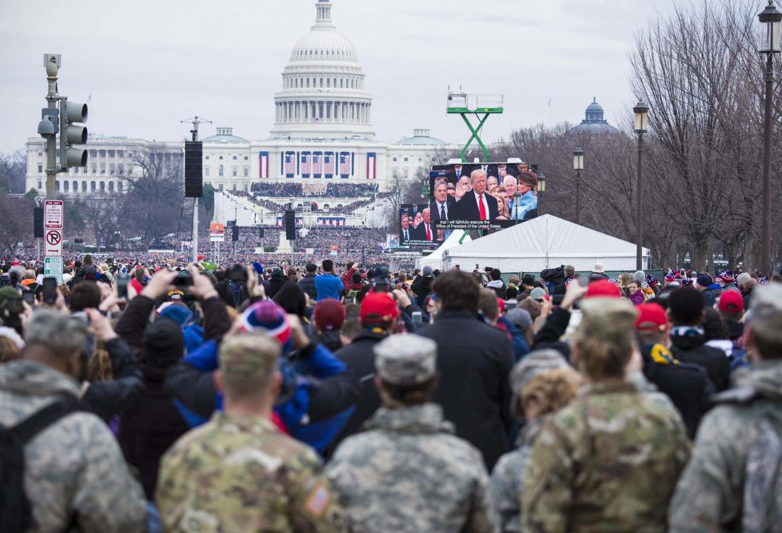 Soldiers and Airmen from the Florida National Guard look on as President Donald Trump takes the oath of office during the 2017 Presidential Inauguration. Florida sent approximately 340 Soldiers to provide support to the U.S. Park Police during the event. Photo by Ching Oettel