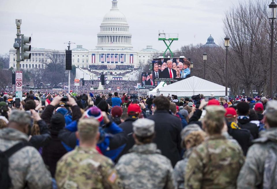 Soldiers and Airmen from the Florida National Guard look on as President Donald Trump takes the oath of office during the 2017 Presidential Inauguration. Florida sent approximately 340 Soldiers to provide support to the U.S. Park Police during the event. Photo by Ching Oettel