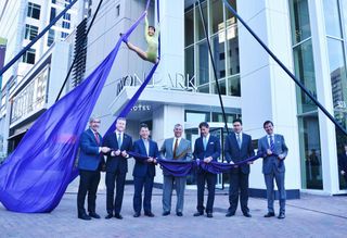 300 South Tryon celebrated its grand opening with business and city leaders and an aerialist.