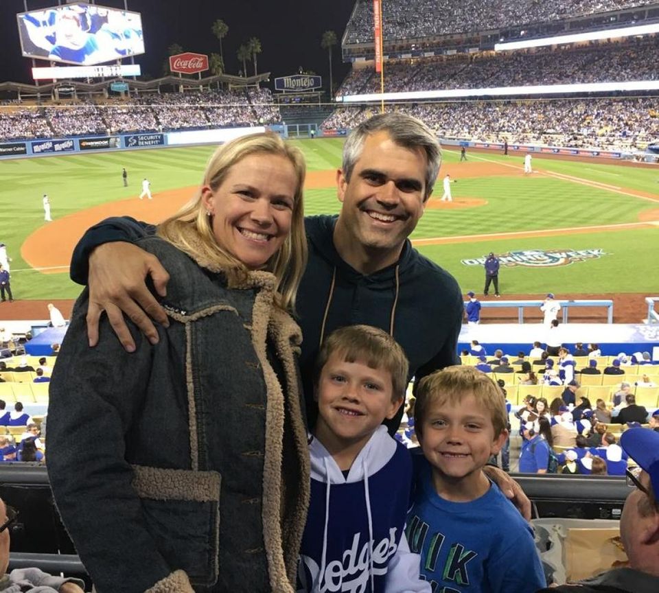 Justin Collins, wife, Mandi, and two of his three children, Cody and Connor.
