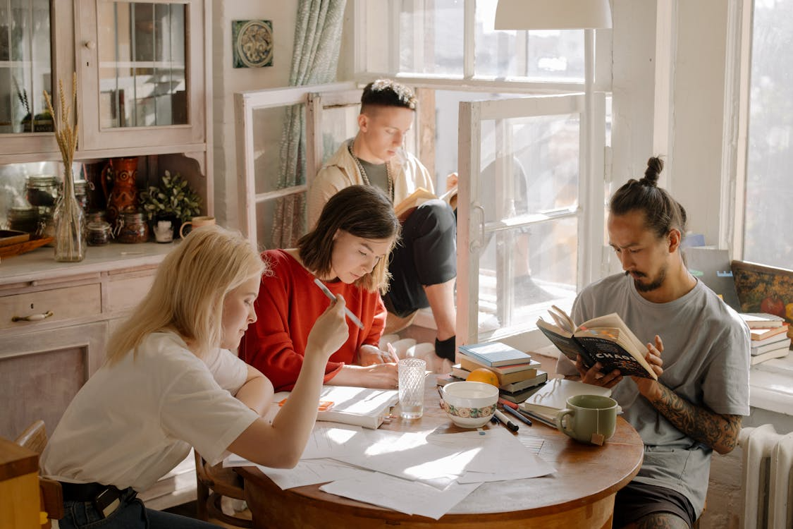 group of students studying in the dining room