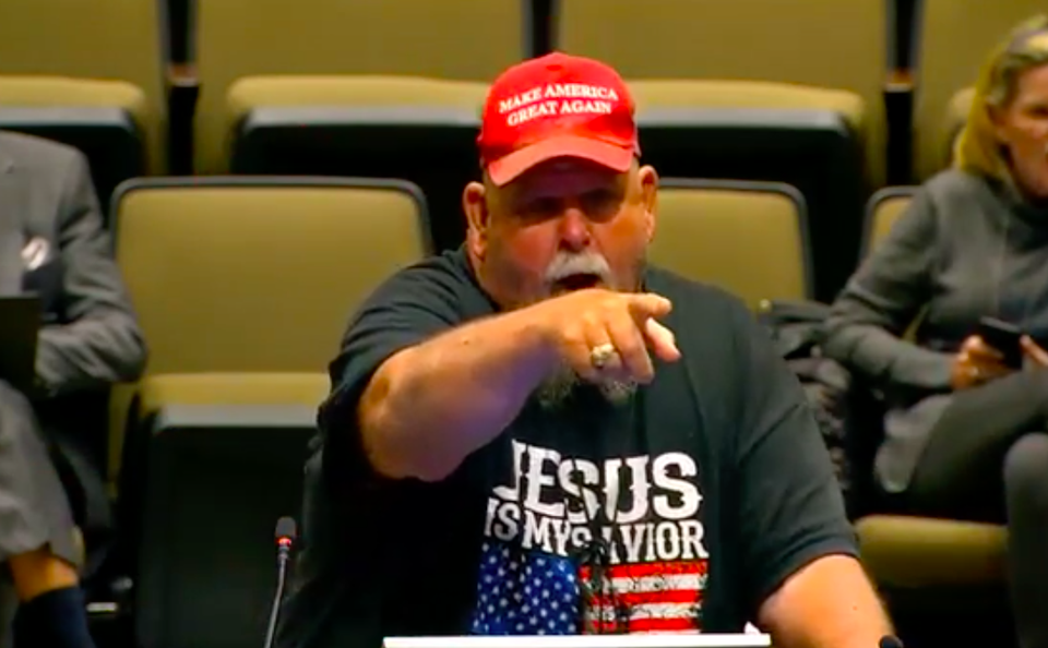 man yelling during City Council meeting