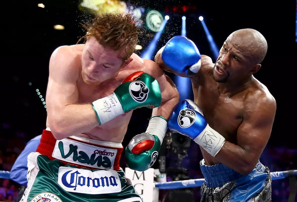 Floyd Mayweather Jr., seen here in the ring against Canelo Alvarez, never lost in his illustrious boxing career.