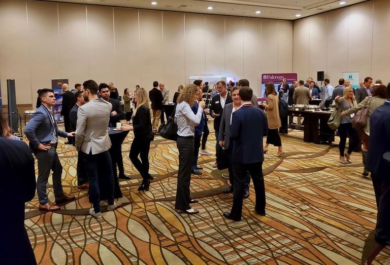 Attendees network at Bisnow's Orange County Multifamily Summit Nov. 21 at the Hilton Anaheim