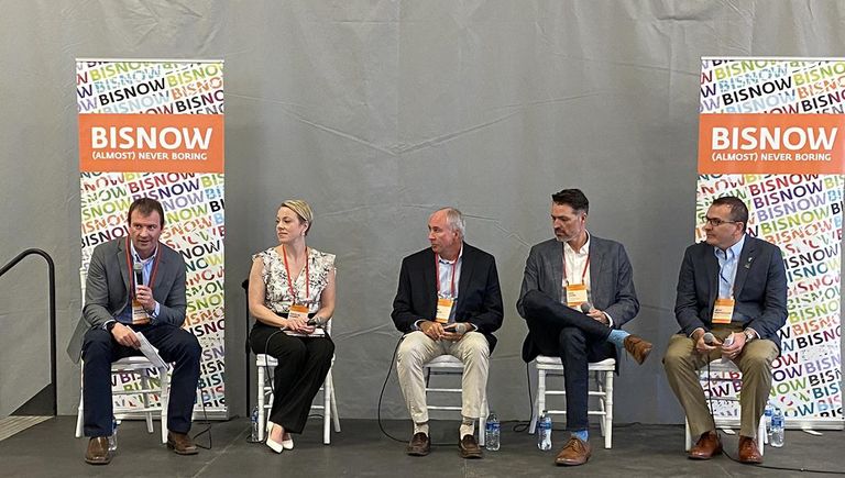 Photo of panelists participating in Bisnow's first ever state of the aerospace industry event held in Denver. 