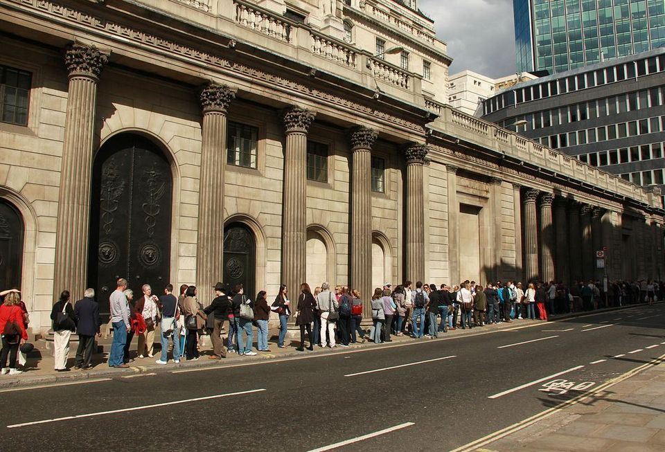 waiting in line at the bank of england in 2010 stock image