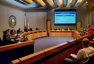 Los Angeles Angels Senior Vice President Molly Jolly (right) addresses the Anaheim City Council during a council meeting Dec. 20 at the Anaheim City Hall in Anaheim.