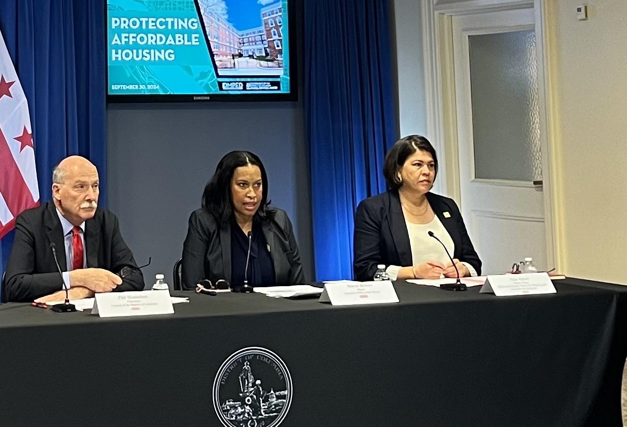 D.C. Council Chairman Phil Mendelson, Mayor Muriel Bowser and Deputy Mayor Nina Albert at a Sept. 30 briefing on efforts to protect the city's affordable housing stock. 