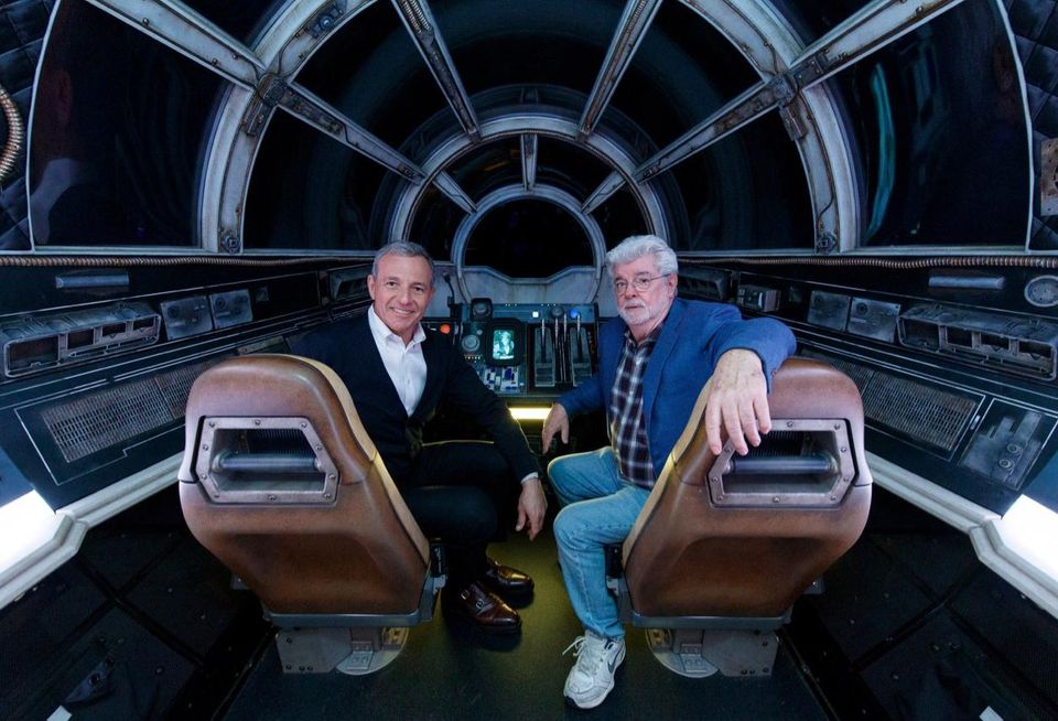 The Walt Disney Co. Chairman and CEO Bob Iger and Star Wars creator George Lucas pose inside Millennium Falcon: Smugglers Run at Star Wars: Galaxy’s Edge at Disneyland Park in Anaheim, California.