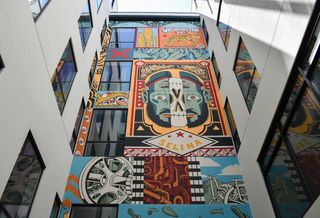 A mural in the courtyard of the Selina Union Market hotel