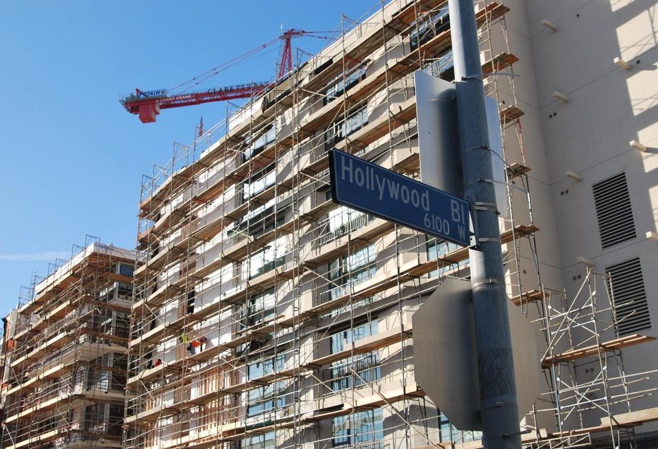 Construction crane rises over new development in Hollywood, Calif.