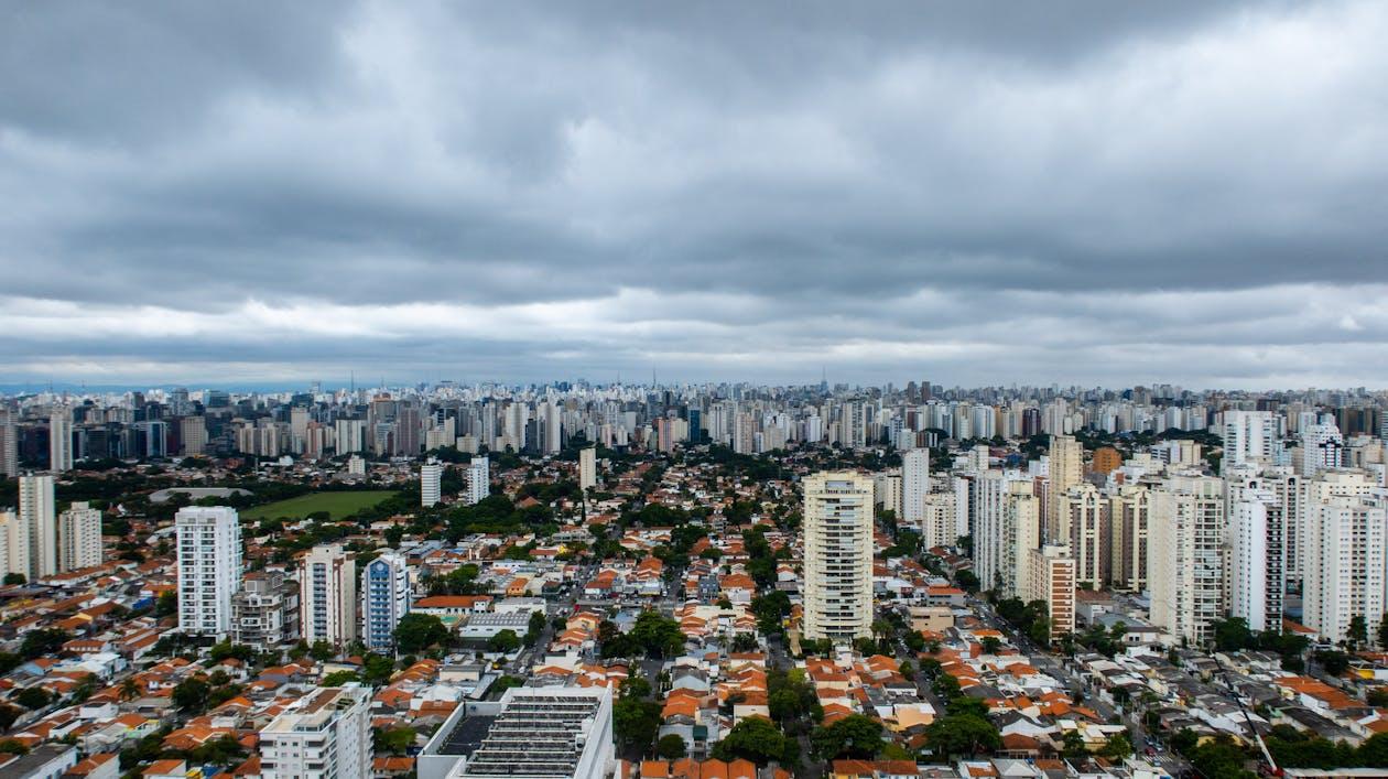 Various housing under cloudy sky