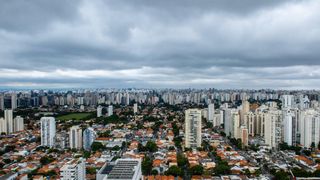 Various housing under cloudy sky