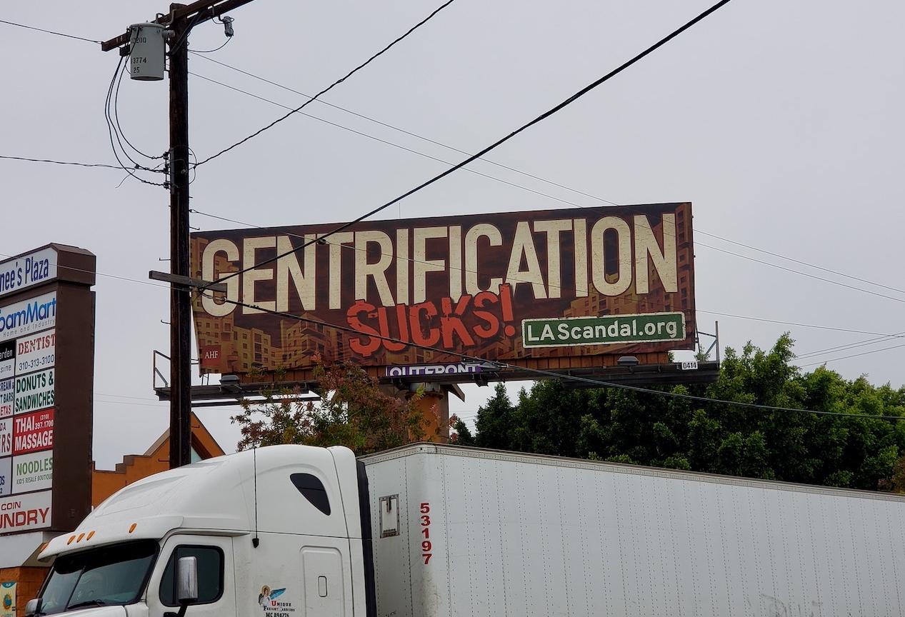 A billboard by Housing is a Human RIght, an organization that is pushing for stricter rent control in California