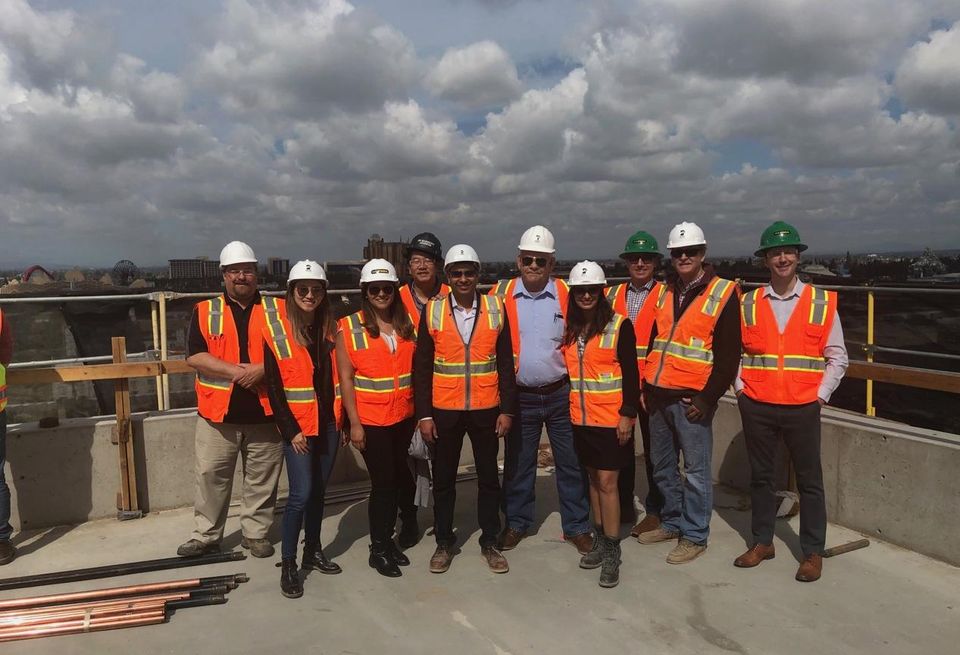Members of the Prospera Group team celebrates the topping off of the JW Marriott, Anaheim's newest four diamond resort