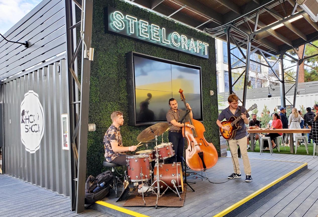 A band plays on a stage at SteelCraft Garden Grove in Orange County