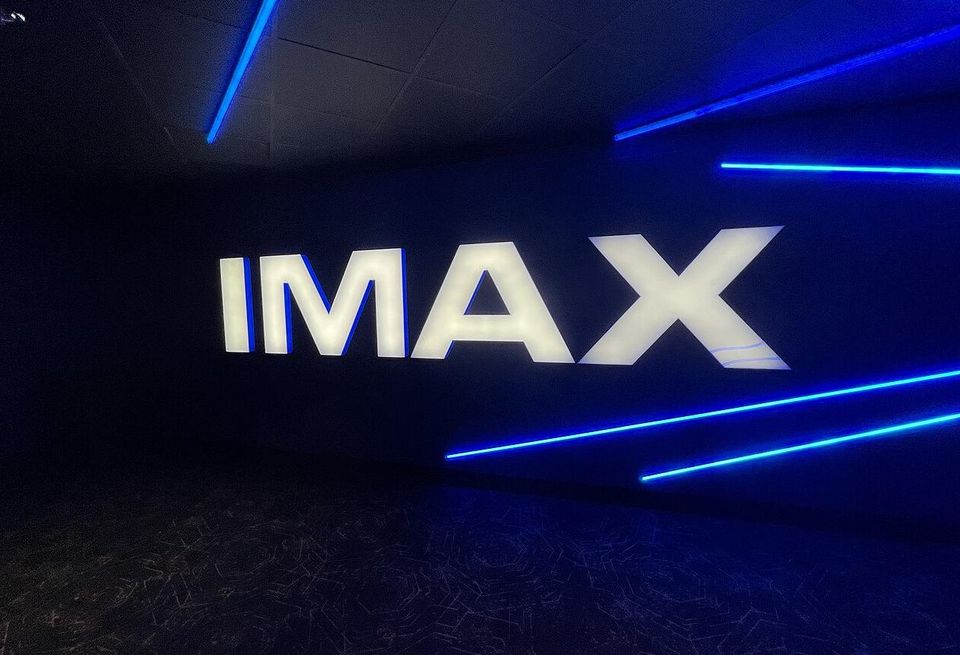 Blue sign with IMAX on it