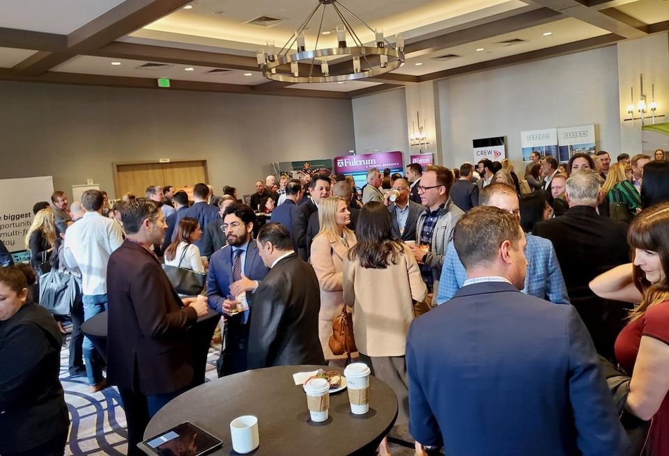 Attendees network at Bisnow's Orange County Construction and Development event at the Irvine Marriott hotel in Irvine