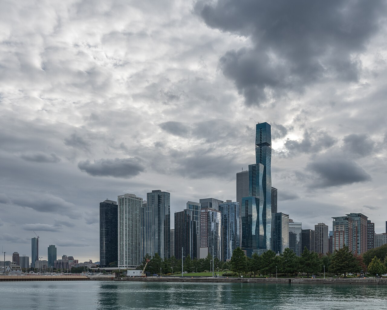 Chicago skyline under a cloudy sky.
