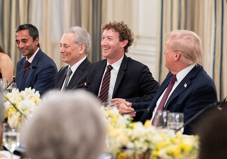 Mark Zuckerberg sits with Donald Trump and tech leaders at a dinner.