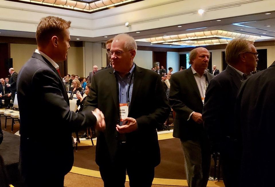 Attendees network after a panel at Bisnow's Los Angeles Hotel Summit at the Omni Los Angeles Hotel in downtown Los Angeles